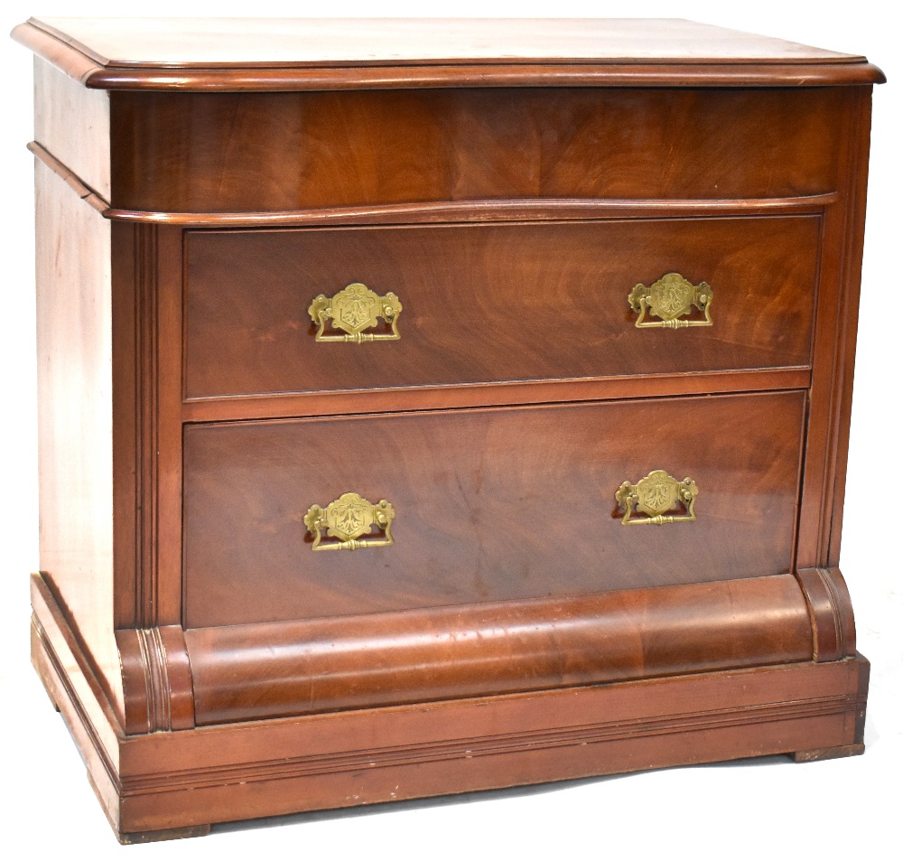 A Victorian mahogany serpentine front three-drawer chest,