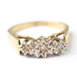 A vintage 9ct gold three-stone diamond illusion set ring, size N, approx 3g.