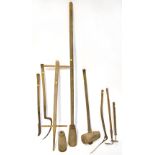 Various farm and vintage garden tools to include a wooden and steel post hammer,
