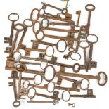 A quantity of vintage iron keys of various shapes and sizes,