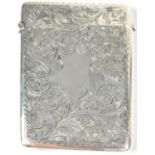 A George V hallmarked silver card case of rectangular form,