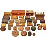 A large collection of various wooden boxes to include eleven circular boxes with lids,