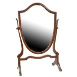 An early 20th century mahogany shield-shaped dressing table swing mirror, height 61cm.