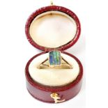 A vintage 9ct gold opal ring, the rectangular bezel set opal with lines of green, blue and black,