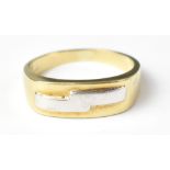 A modern gentlemen's 9ct gold signet ring with raised white metal 'flash' style symbol, size F,