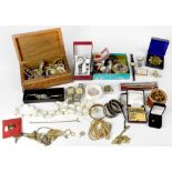 A quantity of costume jewellery to include vintage brooches, necklaces, watches, compact,
