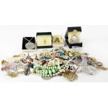 A small collection of costume jewellery to include fashion rings, necklaces, brooches, bracelets,