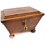 A Regency mahogany cellarette of sarcophagus shape, with stepped lid exposing lead-lined inner,
