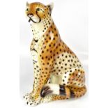 CLF FAJANCAS; a Portuguese large ceramic model of a seated cheetah, height 60cm.