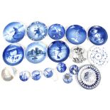 ROYAL COPENHAGEN; a set of six blue and white cabinet plates, a slightly larger example,