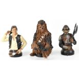 Three collectible Star Wars Mini busts comprising Han Solo,