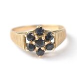 A vintage 1970s hallmarked 9ct gold sapphire cluster ring,