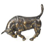 A decorative cast metal figure of a bull, length 18cm.