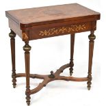 A reproduction mahogany quarter veneered and floral inlaid fold-over games table,