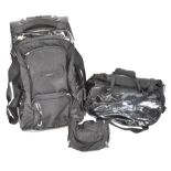 HENRI LLOYD; a large two-wheeled soft-sided travel case with compartments, length 76cm,