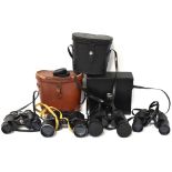 Four pairs of vintage binoculars to include cased Prinz 10x50 coated optics field binoculars,