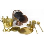 A quantity of brass and copper ware to include a copper coal scuttle, brass jam pan, trays,