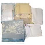 A large quantity of various bed spreads, duvet covers and bed linen,