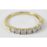 A 9ct white gold half eternity ring set with eight diamonds, size L, approx 3g.