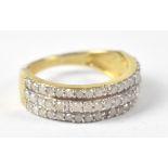 A 9ct yellow gold ring set with three rows of tiny diamonds, size L, approx 2.9g.