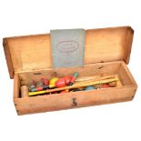 A vintage boxed table croquet set with instruction booklet.
