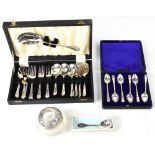 A cased set of six hallmarked silver coffee spoons with monogrammed finials, John Yeomans Cowlishaw,