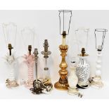 A group of eight various table lamps to include a blanc-de-Chine pierced work example in the