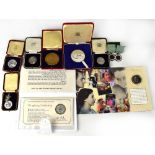 A quantity of commemorative and other coins to include the 1997 Golden Wedding Anniversary of Queen