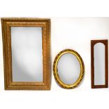 A gilt framed rectangular wall mirror, 86 x 56cm, a similar oval example,