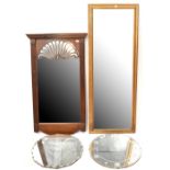 A modern rectangular gilt framed wall mirror with bevel edge plate,