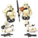 A pair of Star Wars deluxe collectible busts comprising two Sand Troopers with white and orange
