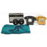 A pale yellow Bakelite telephone, a dark green example, a Roberts walnut cased radio, model R404,