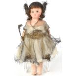 An early 20th century wax head fairy doll with composite body,