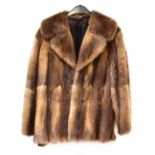 A vintage fur jacket by Sacks & Brendlor, with black satin lining, length 79cm.