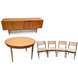 G-PLAN; a teak dining suite comprising a long sideboard, a table, height 72.5cm, diameter unextended