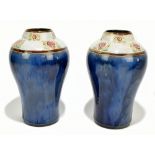 ROYAL DOULTON; a pair of Art Ware vases of inverted baluster form, the necks with moulded floral