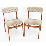 A set of six mid century teak dining chairs, with floral upholstery, on tapered legs, chair height