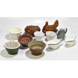 A mixed lot of assorted ceramics including kitchenalia items, salt glazed jelly moulds, reproduction