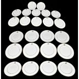 CLEAVE; a part set of twenty-four bone china dinner and dessert plates, each decorated with