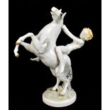 K. TUTTER for HUTSCHENREUTHER; a ceramic figure of a nude maiden riding a rearing horse, printed