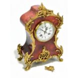 A Louis XV style gilt metal mounted tortoiseshell eight day mantel clock, with enamel Roman