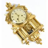 A Swedish Louis XVI style gilt wood cartel type eight day wall clock, the Roman numeral dial