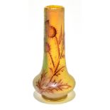 DAUM NANCY; an Art Nouveau cameo glass vase of baluster form with elongated neck, decorated with