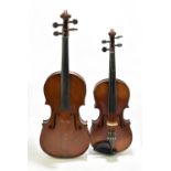 A full-size German violin, unlabelled, the one-piece back length 36cm, cased with two bows, also a
