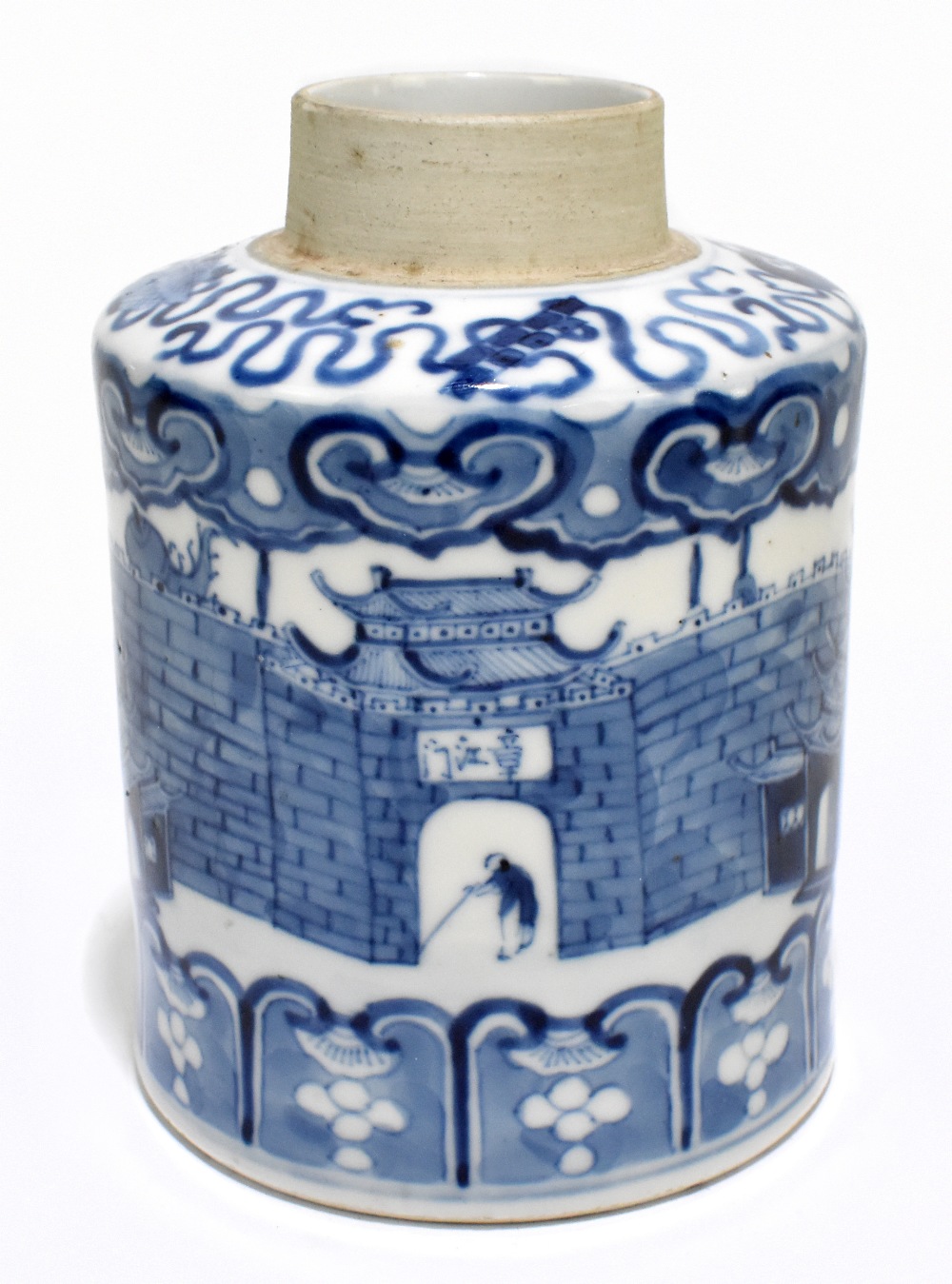 A late 19th century Kangxi style blue and white tea canister, decorated throughout with an