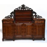 A 19th century French mahogany inverted breakfront mirrored back server/sideboard, the central