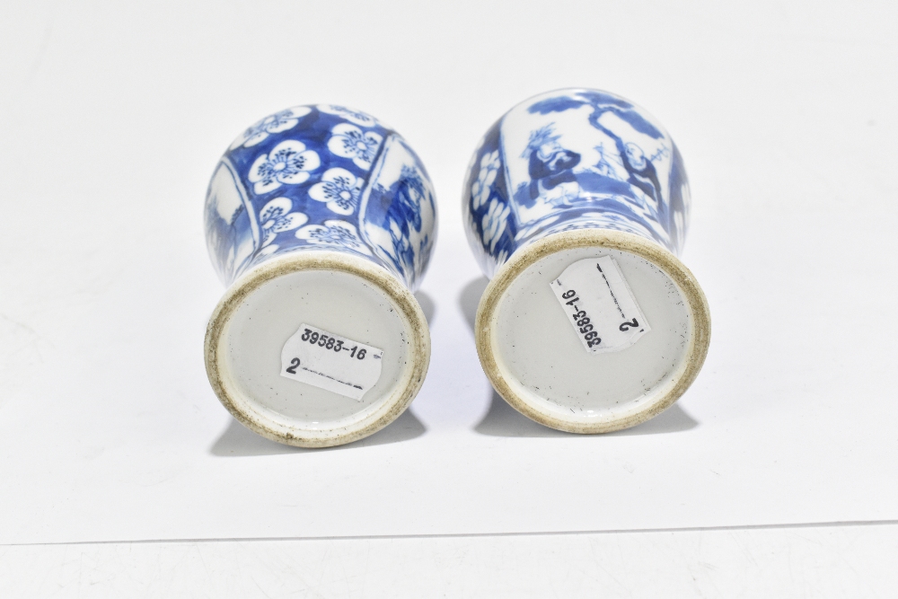 A pair of late 19th century Chinese Kangxi style blue and white vases, decorated with panels of - Image 6 of 6