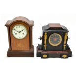 A Victorian black slate and rouge marble mantel clock of architectural form, in the Aesthetic