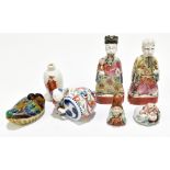 A group of Chinese ceramics including a Famille Rose figure of a boy playing a drum, snuff bottle