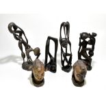 ETHNOGRAPHIA; four Nigerian West African carved hardwood figures, the tallest 40cm, together with